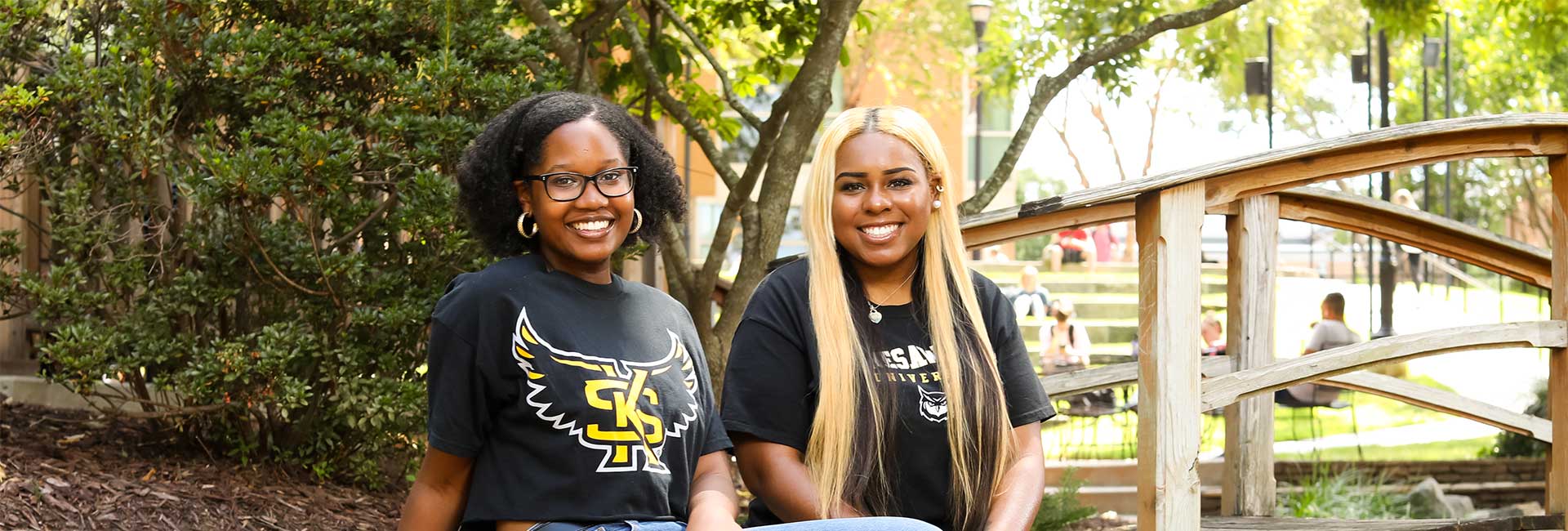 Leadership students sitting near legacy gazebo.