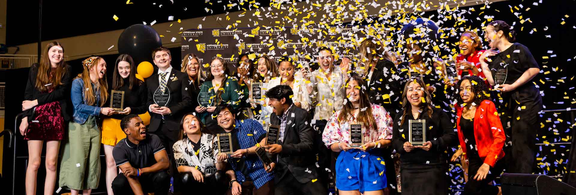 KSU Student Leader Award Winners celebrating together on stage