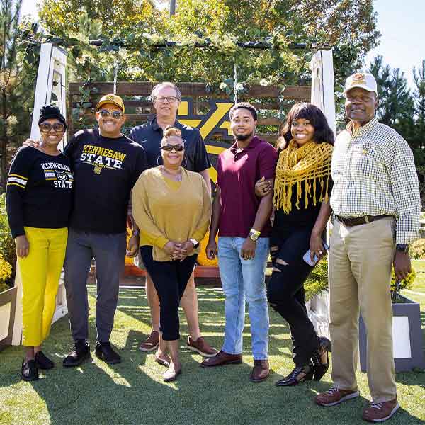 group of ksu alumni at the tailgating event.