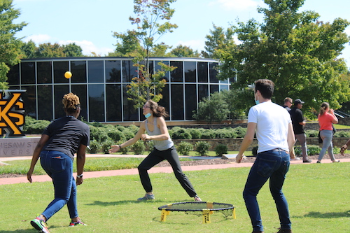 ksu students playing with ball outside