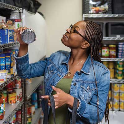 ksu student shopping for good at care services food pantry