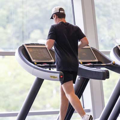 student running on a treadmill
