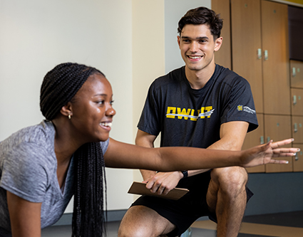 ksu student working with personal trainer