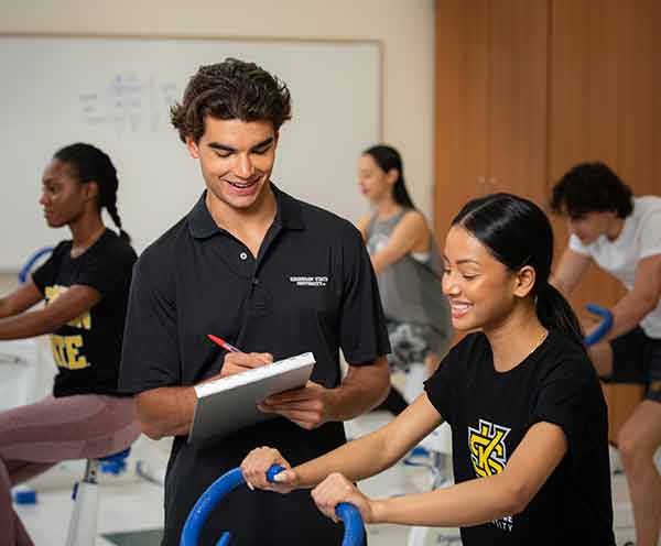 ksu students performing health assessments using treadmill