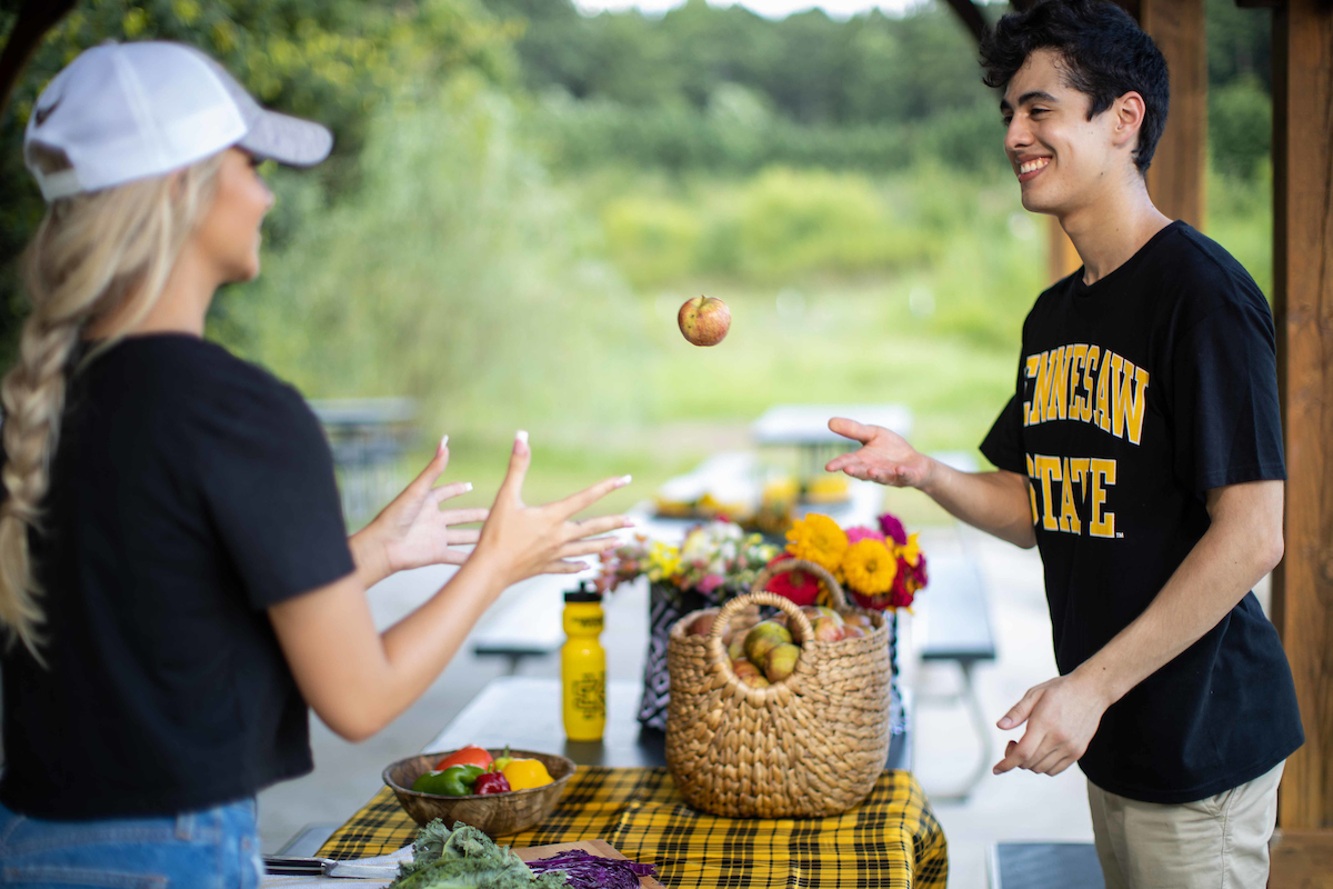 Students with produce from the field station market