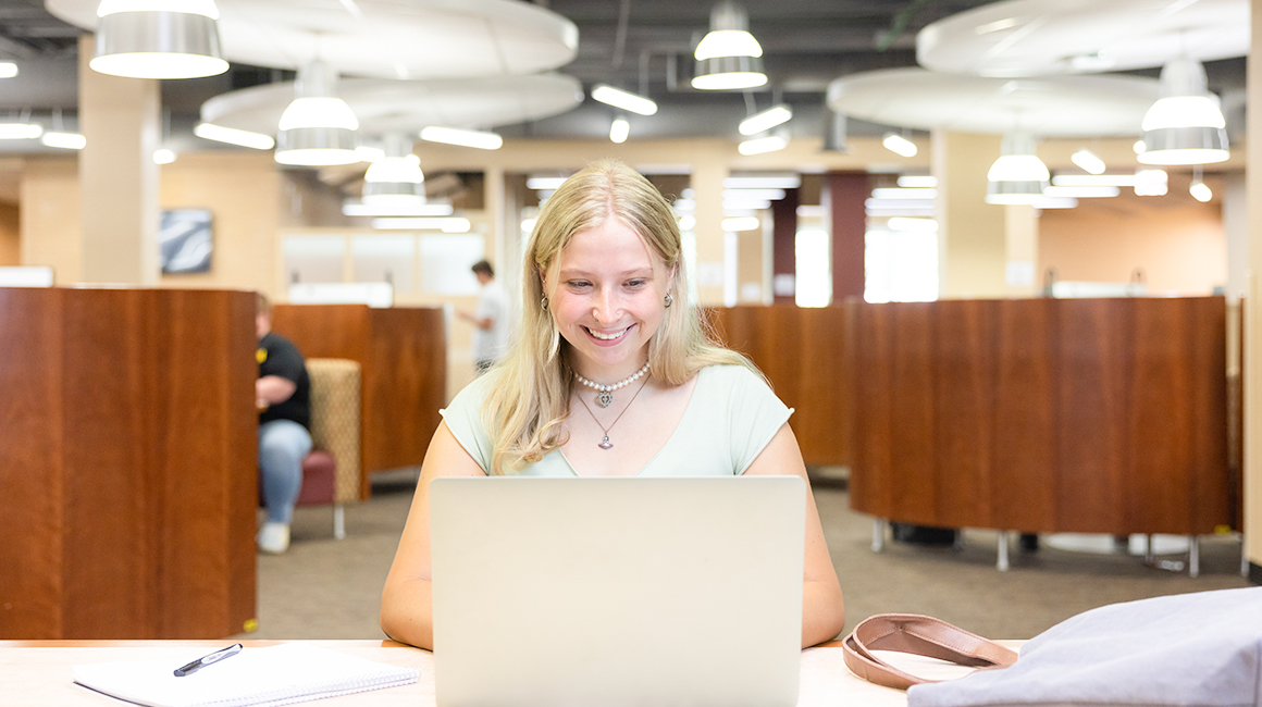 group of students sitting in ksu's library