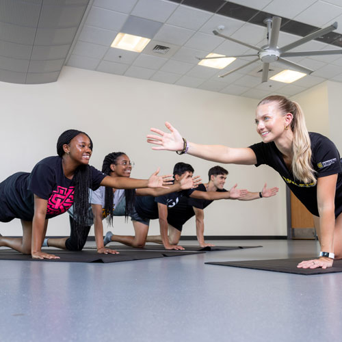 students in a yoga class