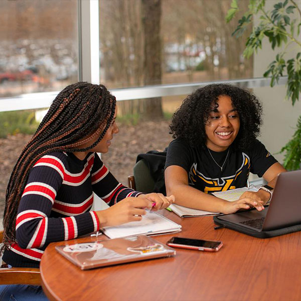 ksu students at a table studying