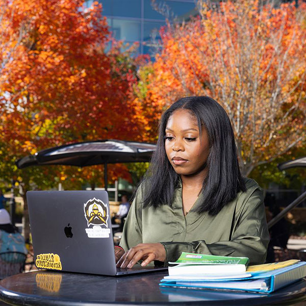 ksu student using their laptop