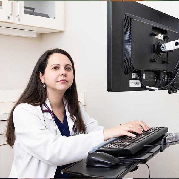 ksu nursing student looking at computer.