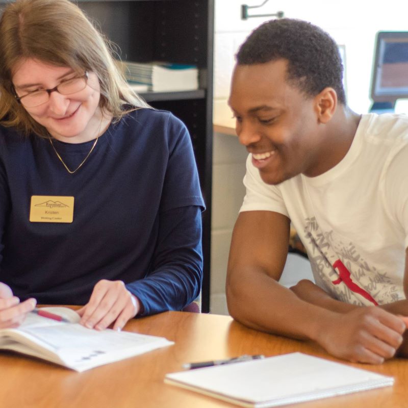 KSU graduate and student at the writing center.
