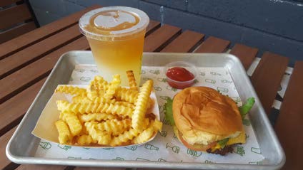 hamburger fries tea and ketchup